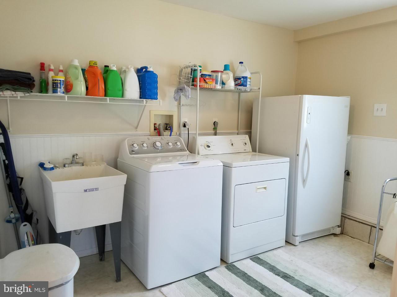 6808 Dunhill Road Baltimore, MD 21222 - Photo 15 of 30 Laundry room with extra space for storage.
