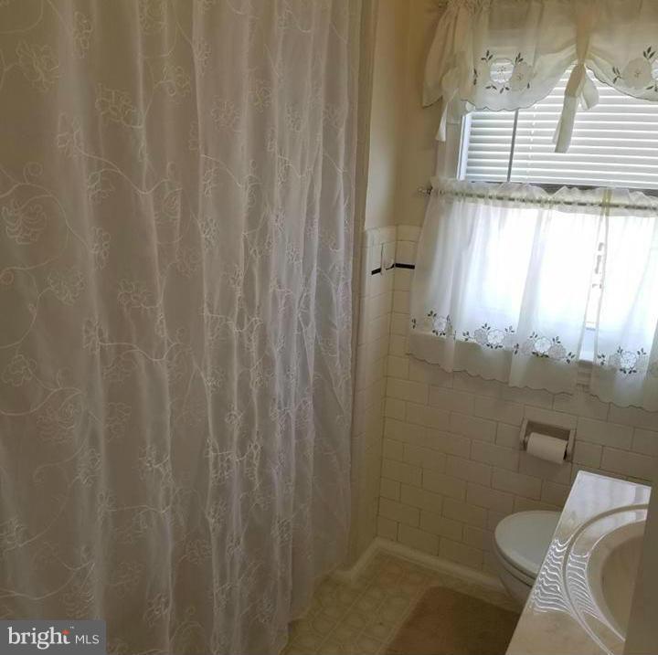 6808 Dunhill Road Baltimore, MD 21222 - Photo 19 of 30 Second floor bathroom.