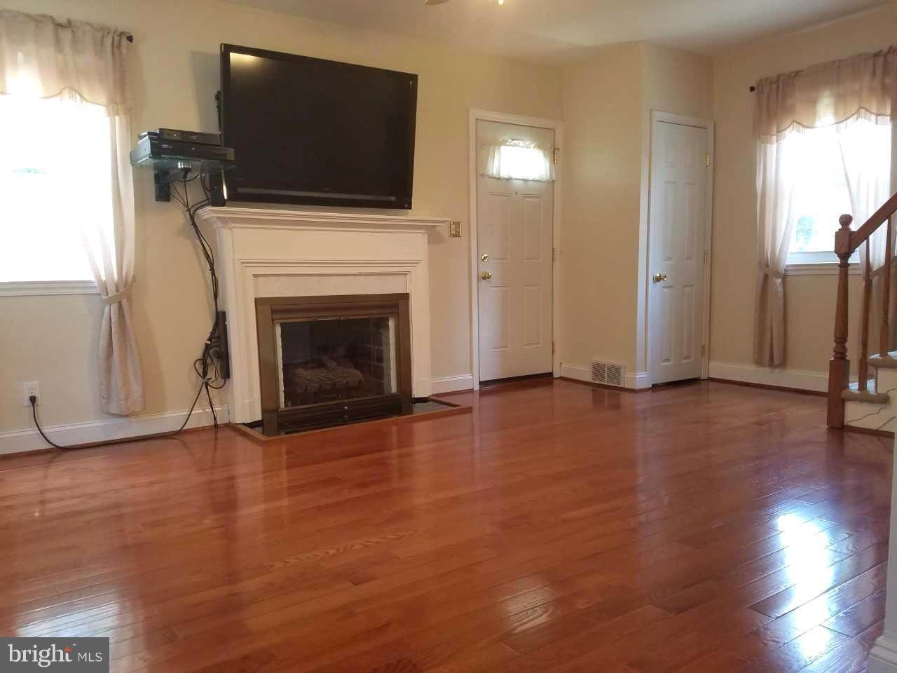 6808 Dunhill Road Baltimore, MD 21222 - Photo 4 of 30 Fireplace for those cold nights.