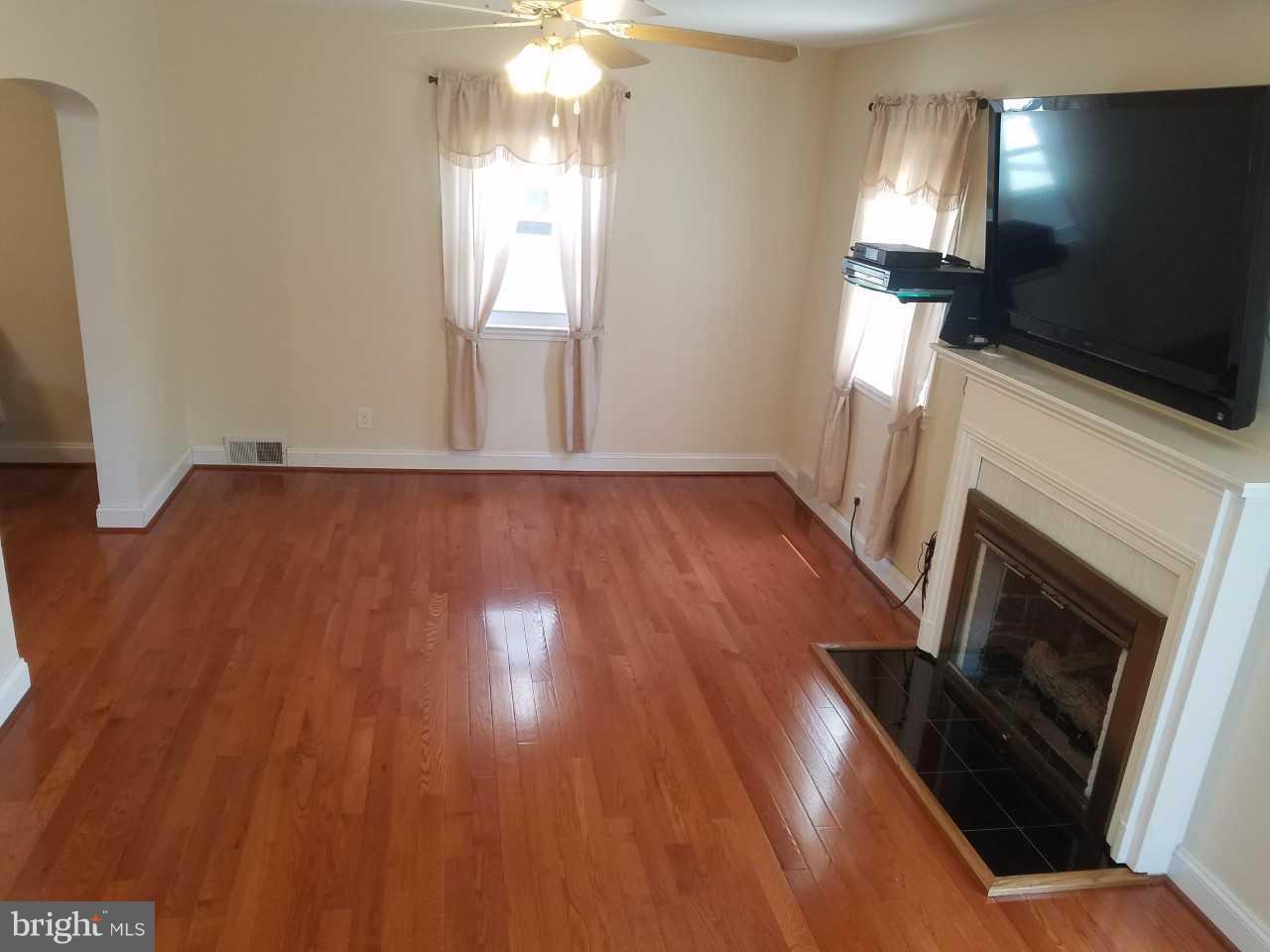 6808 Dunhill Road Baltimore, MD 21222 - Photo 5 of 30 Hardwood Floors in the living room.