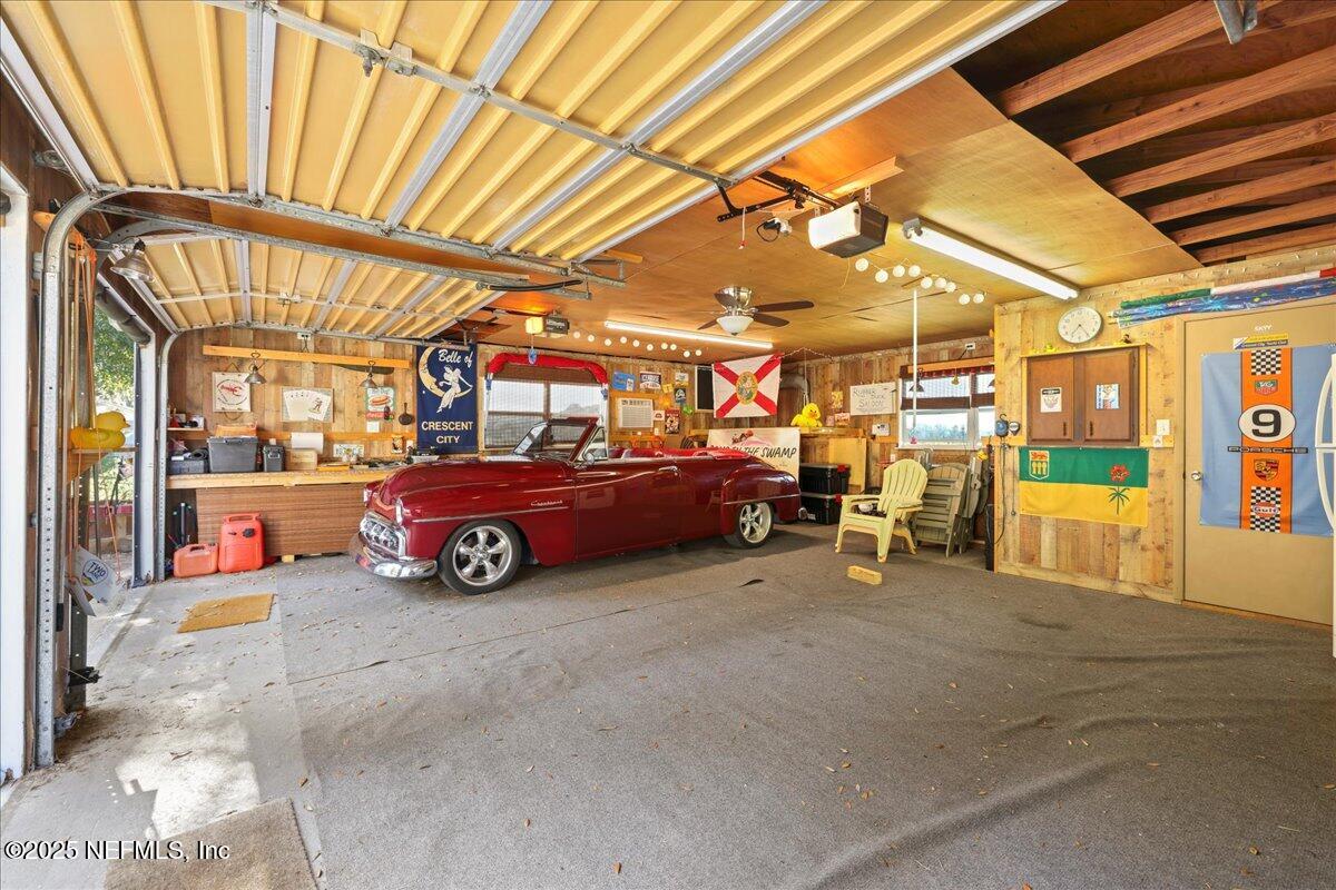 802 Lemon Avenue Crescent City, FL 32112 - Photo 26 of 46 a view of parking garage with cars parked