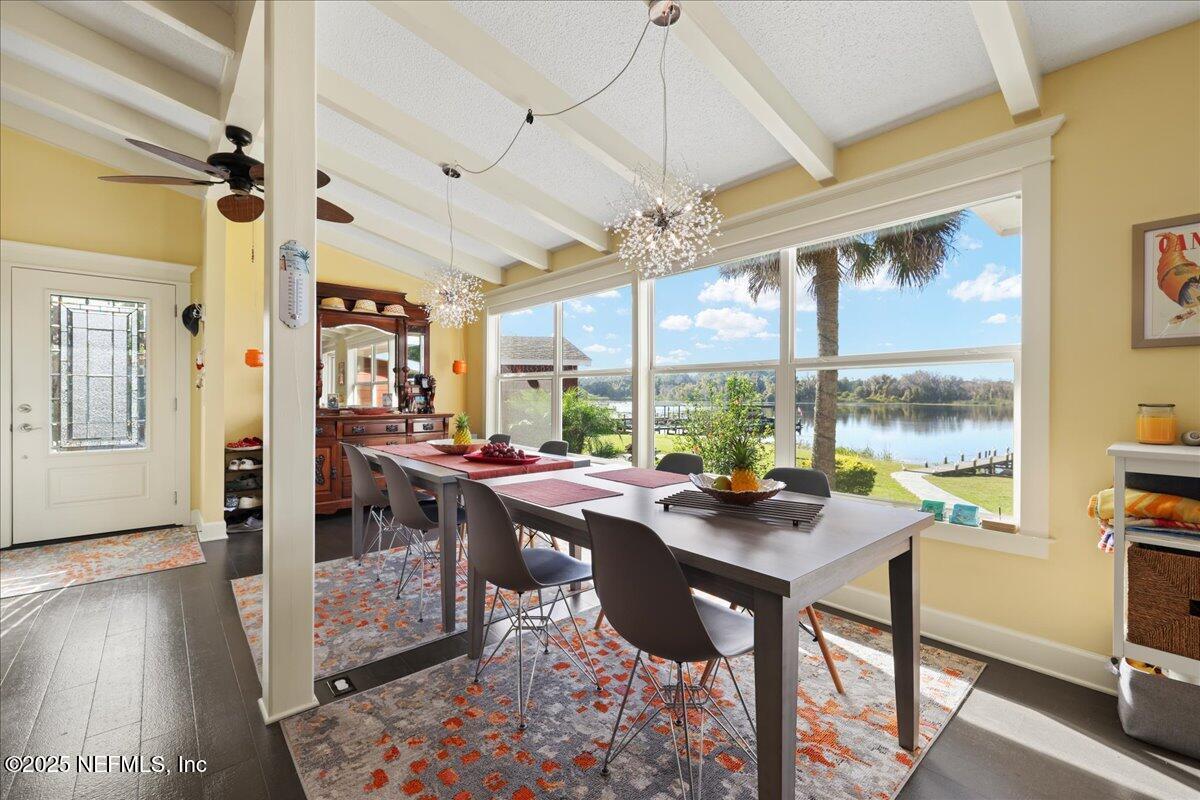 802 Lemon Avenue Crescent City, FL 32112 - Photo 3 of 46 a room with lots of table and a large window