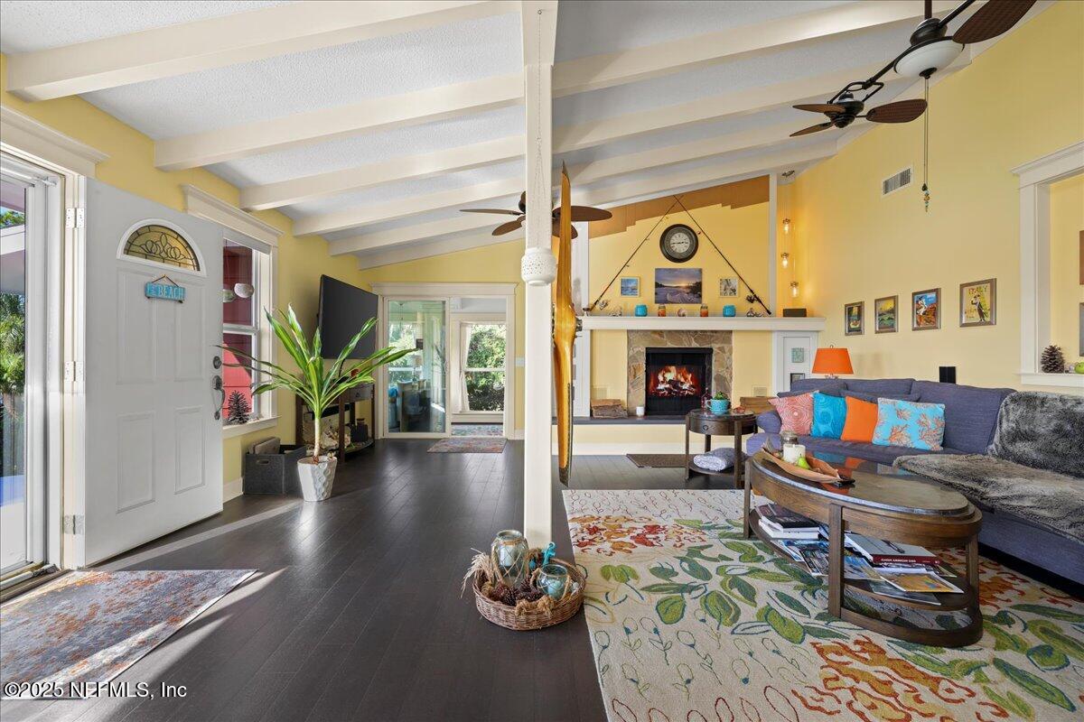 802 Lemon Avenue Crescent City, FL 32112 - Photo 7 of 46 a living room with furniture fireplace and a fireplace