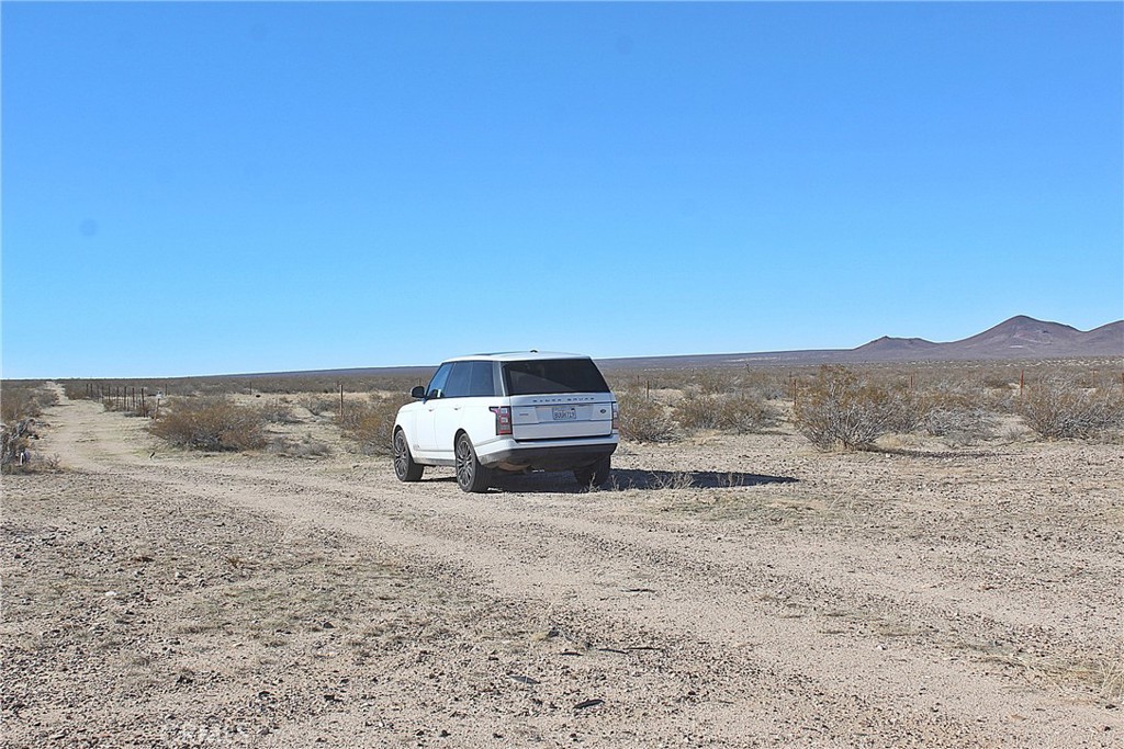 8190 Darter Road Adelanto, CA 92301 - Photo 3 of 9 a view of roof with a yard