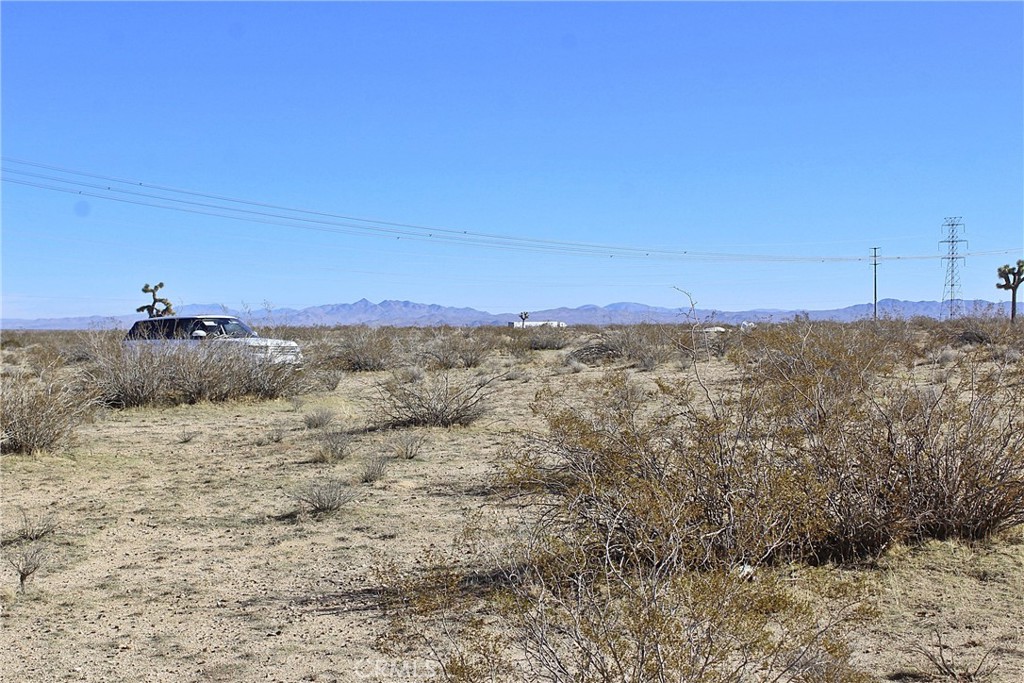 8190 Darter Road Adelanto, CA 92301 - Photo 7 of 9 a view of ocean and green field