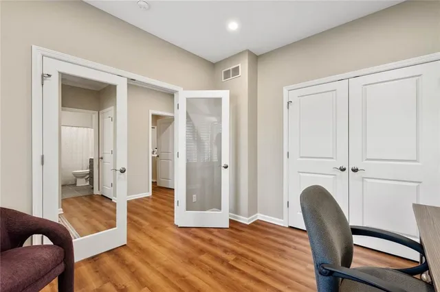 a view of a livingroom with furniture and wooden floor