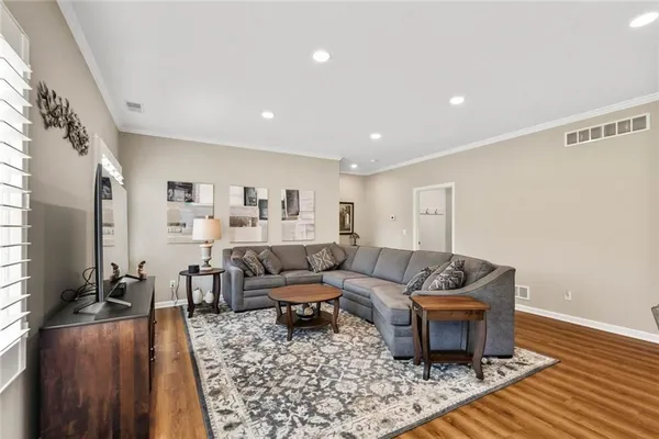 a living room with furniture and a couch