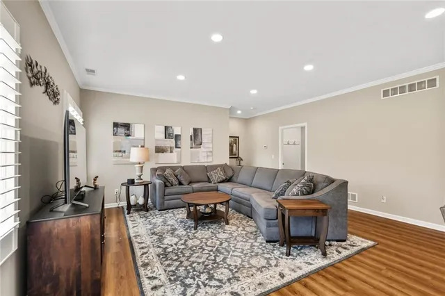 a living room with furniture and a couch