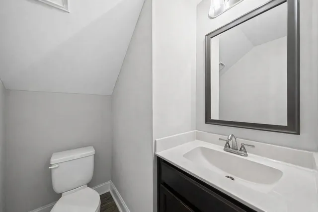 a bathroom with a sink and a toilet