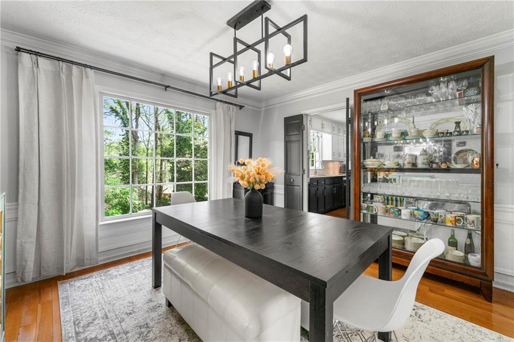 292 Old Rosser Road Stone Mountain, GA 30087 - Photo 13 of 66 a view of a dining room with furniture window and outside view