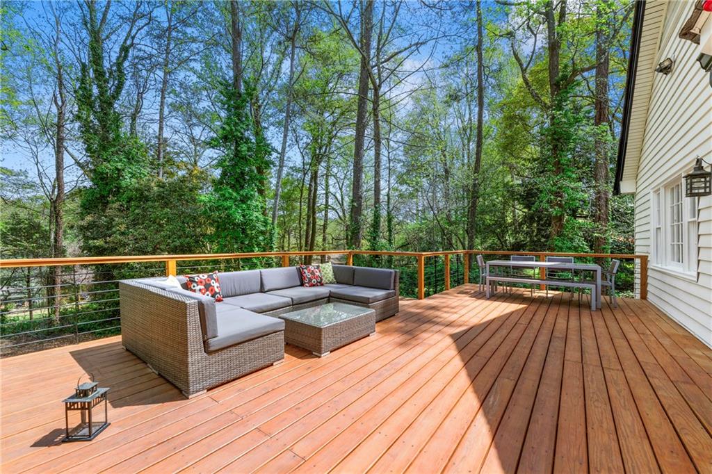 292 Old Rosser Road Stone Mountain, GA 30087 - Photo 2 of 66 a view of a couches on the roof deck