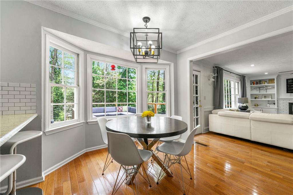 292 Old Rosser Road Stone Mountain, GA 30087 - Photo 21 of 66 a view of a dining room with furniture window and outside view