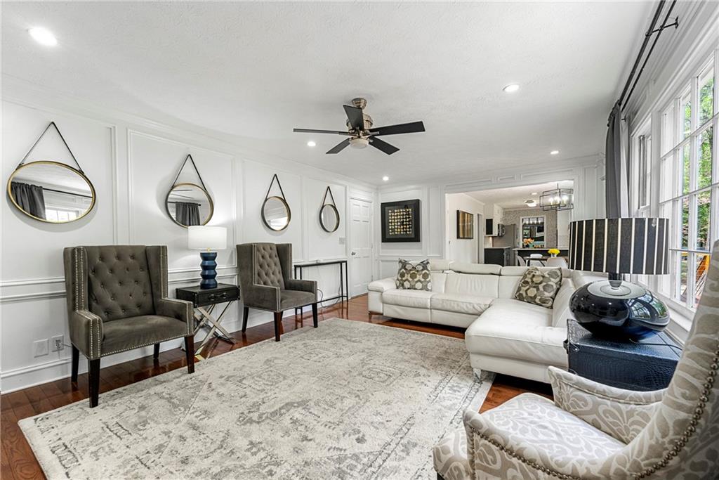 292 Old Rosser Road Stone Mountain, GA 30087 - Photo 26 of 66 a living room with furniture and a large window