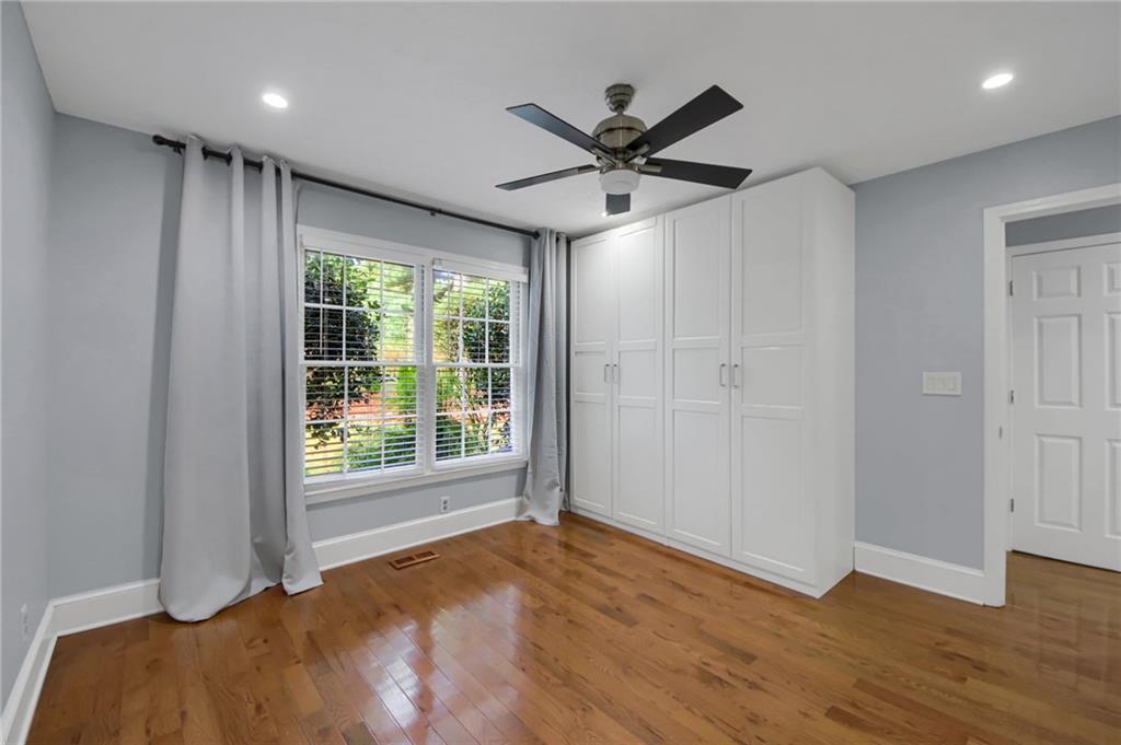 292 Old Rosser Road Stone Mountain, GA 30087 - Photo 30 of 66 a view of a livingroom with a ceiling fan and window