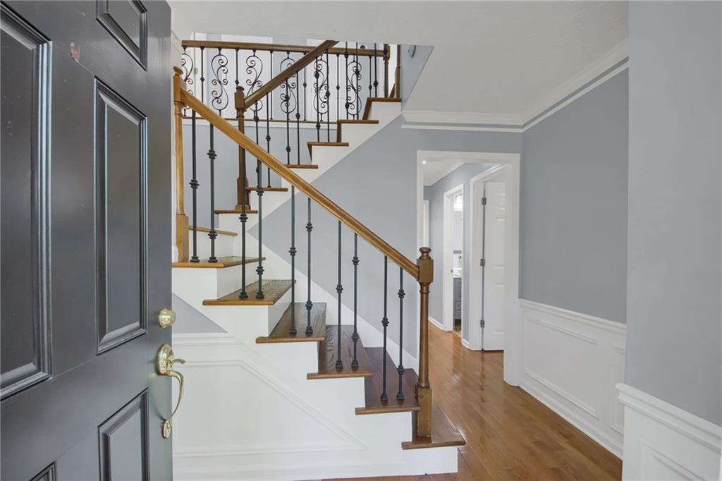 292 Old Rosser Road Stone Mountain, GA 30087 - Photo 6 of 66 a view of entryway and hall with wooden floor
