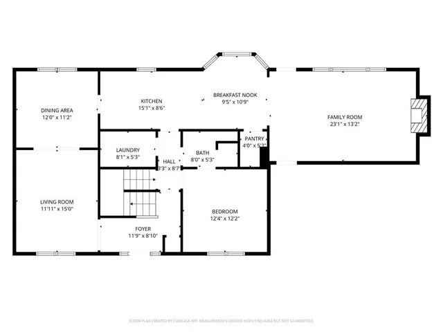 a living room with furniture a chandelier and a flat screen tv