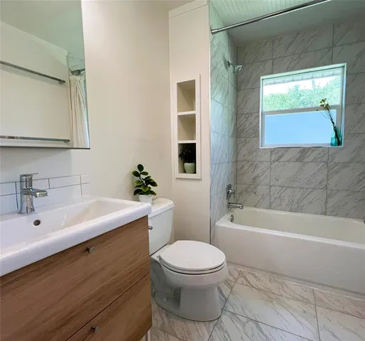 a view of a backyard with a small cabin and chair