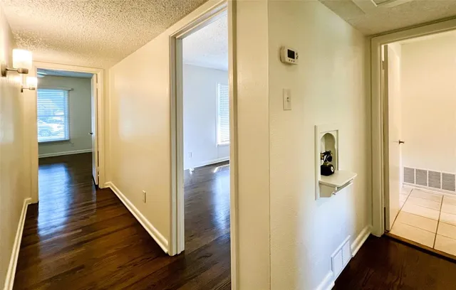 a bathroom with a sink a toilet and bathtub