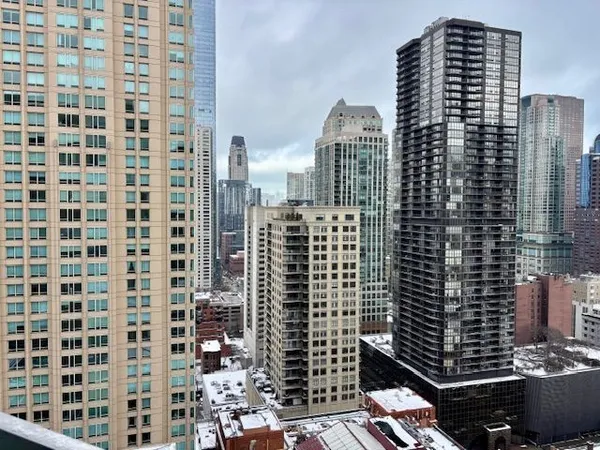 a view of a city with tall buildings