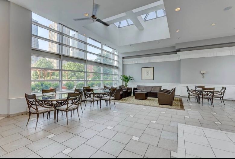 545 North Dearborn Street, Unit W2905 Chicago, IL 60654 - Photo 21 of 25 a group of people sitting in a room