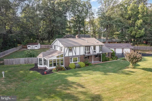 a view of a house with a big yard