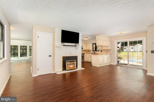 a view of an empty room with a large window