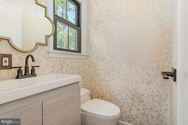 front view of a house with a garden