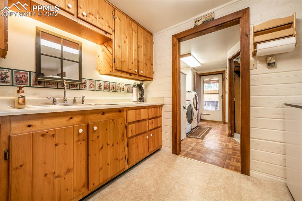 8181 Maple Drive Rye, CO 81069 - Photo 11 of 50 a bathroom with a sink a mirror and a vanity