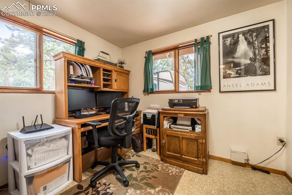 8181 Maple Drive Rye, CO 81069 - Photo 14 of 50 a view of a workspace with furniture and a window