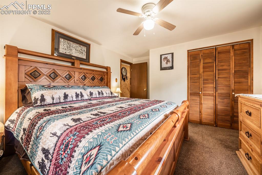 8181 Maple Drive Rye, CO 81069 - Photo 17 of 50 a bedroom with a bed and a window