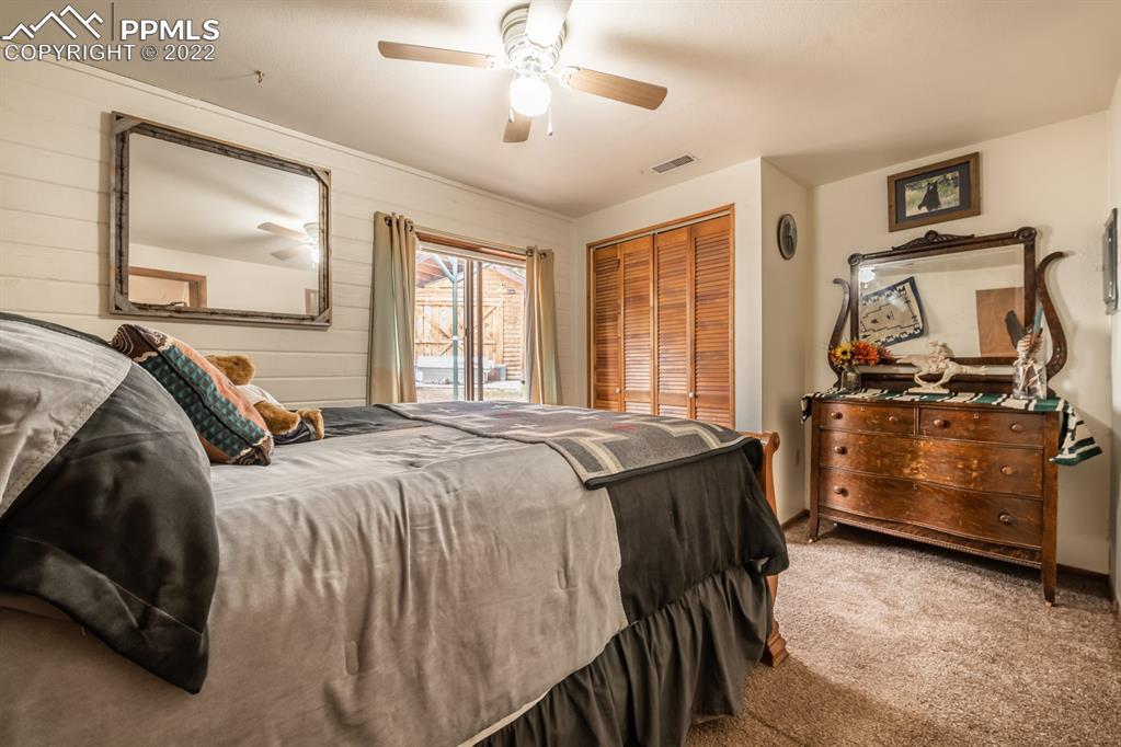 8181 Maple Drive Rye, CO 81069 - Photo 18 of 50 a bed room with a bed and a television
