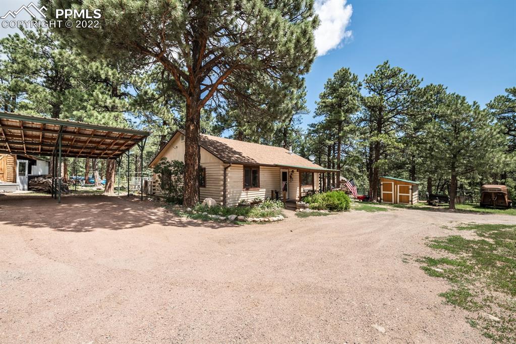8181 Maple Drive Rye, CO 81069 - Photo 2 of 50 a front view of a house with a yard and garage