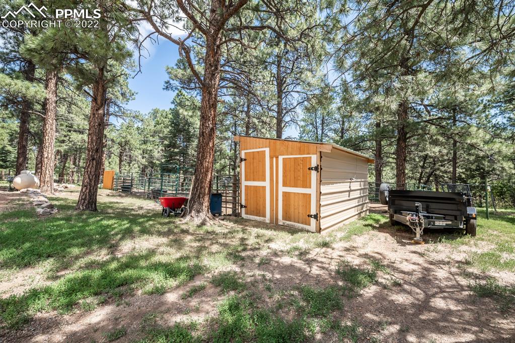 8181 Maple Drive Rye, CO 81069 - Photo 27 of 50 a view of a bench in a backyard