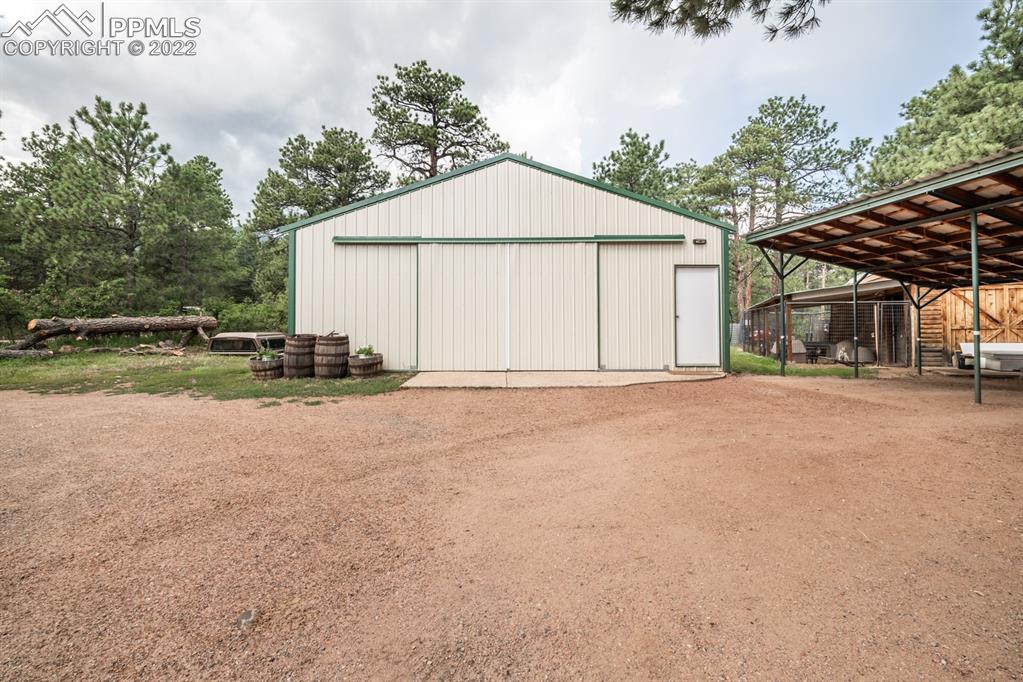 8181 Maple Drive Rye, CO 81069 - Photo 31 of 50 a view of a house with backyard and trees