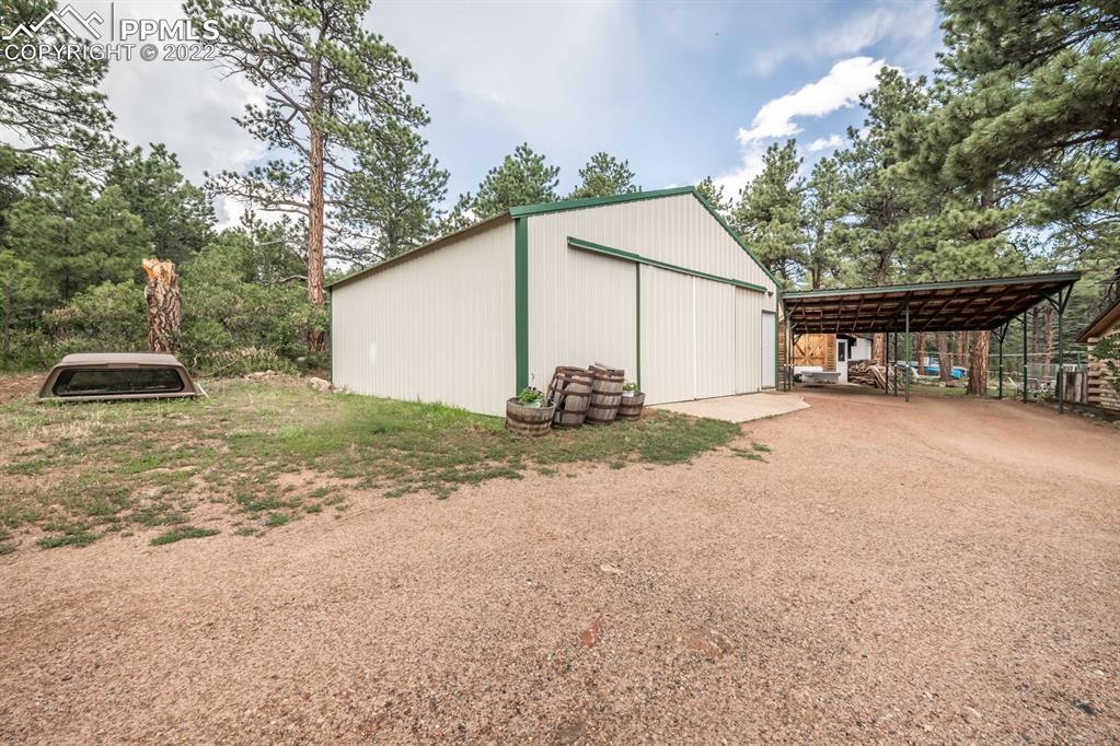 8181 Maple Drive Rye, CO 81069 - Photo 32 of 50 a backyard of a house with table and chairs