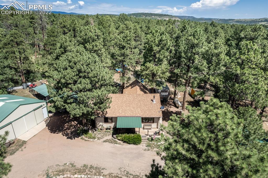8181 Maple Drive Rye, CO 81069 - Photo 37 of 50 an aerial view of a house with a yard and garden