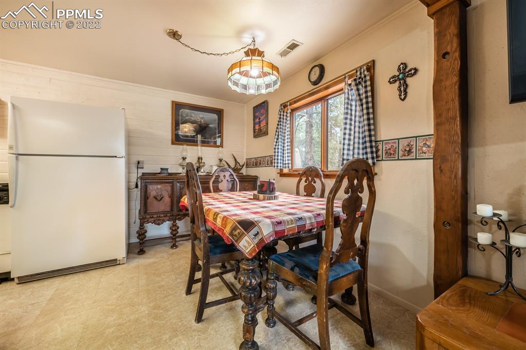 8181 Maple Drive Rye, CO 81069 - Photo 8 of 50 a dining room with furniture and window
