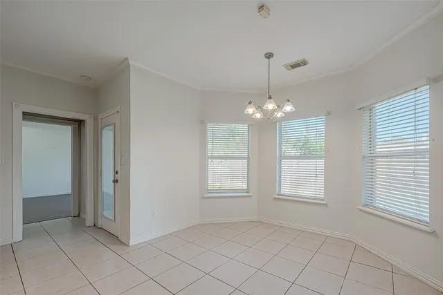 a view of an empty room with window