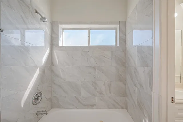 a bathroom with a sink double vanity and a mirror