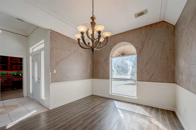 a view of livingroom with furniture and wooden floor