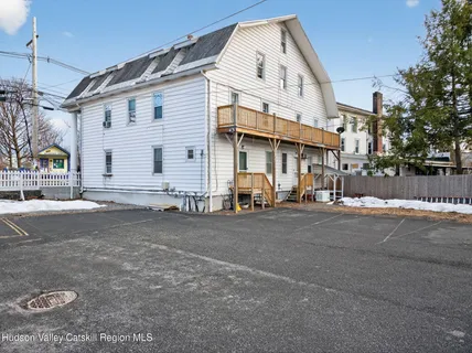 a view of a street with a building