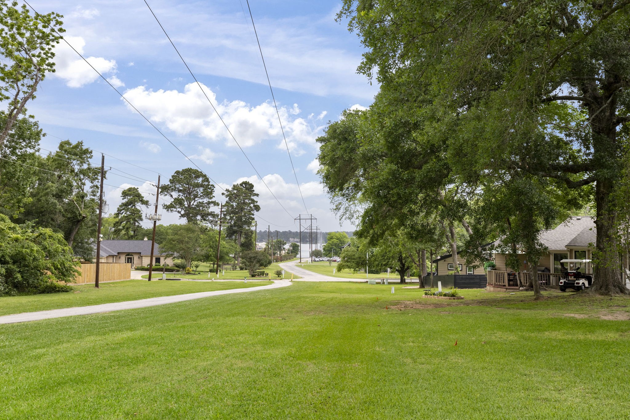 49 April Village Conroe, TX 77356 - Photo 29 of 46 a view of a fountain in front of a house with a big yard