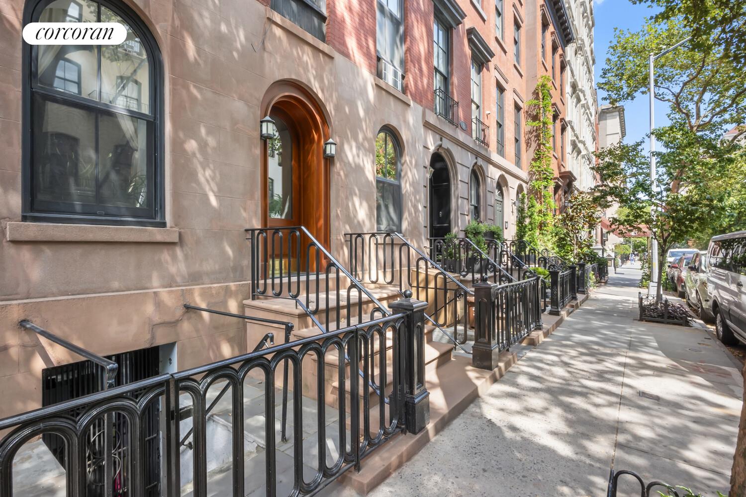 215 East 17th Street, Unit 2 Manhattan, NY 10003 - Photo 6 of 9 a view of a large building with a outdoor space