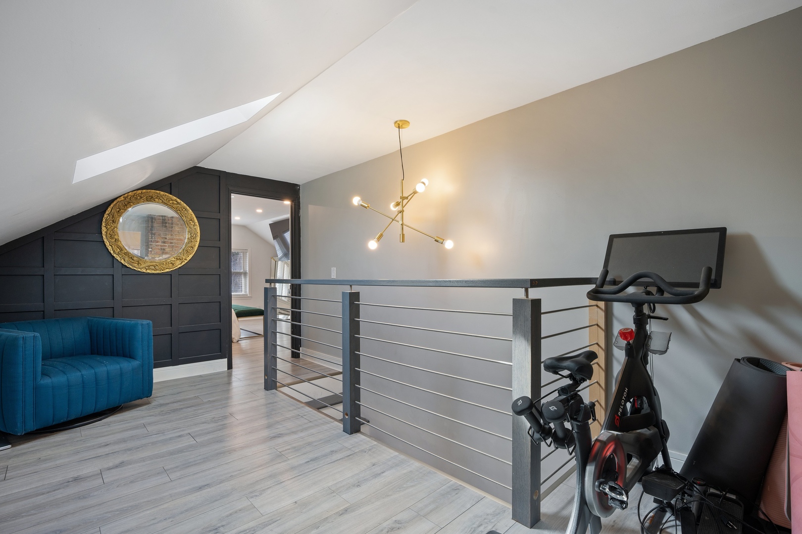3336 Grand Boulevard Brookfield, IL 60513 - Photo 19 of 35 a view of a livingroom with furniture and a gym cycle