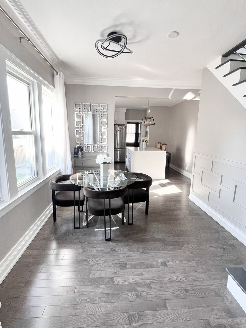 3336 Grand Boulevard Brookfield, IL 60513 - Photo 8 of 35 a view of a dining room with furniture and window