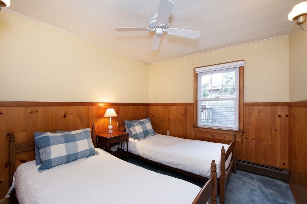 37 Pine Point Road Duxbury, MA 02332 - Photo 12 of 24 a bedroom with a bed and window