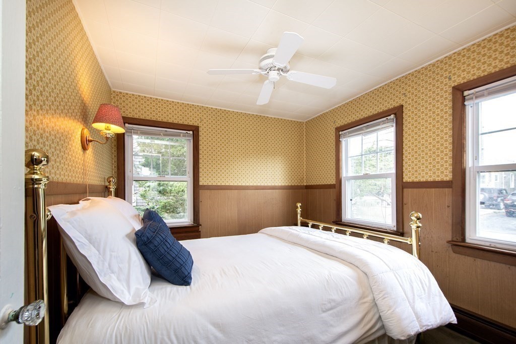 37 Pine Point Road Duxbury, MA 02332 - Photo 13 of 24 a bedroom with a large bed and a window