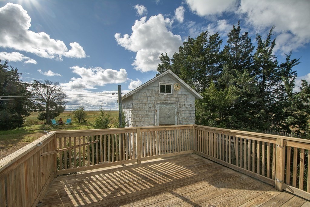 37 Pine Point Road Duxbury, MA 02332 - Photo 19 of 24 a view of a wooden fence