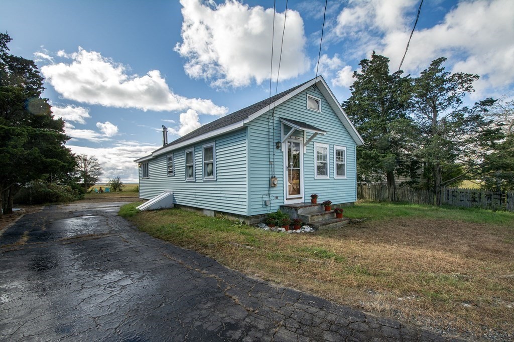 37 Pine Point Road Duxbury, MA 02332 - Photo 22 of 24 a view of a house with backyard
