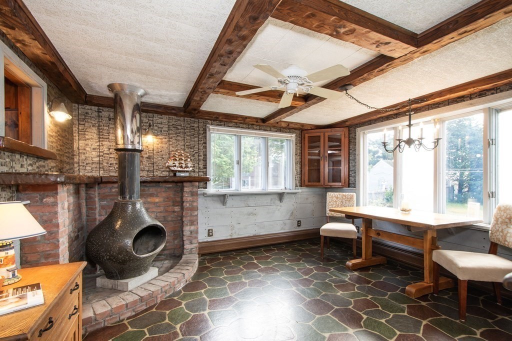 37 Pine Point Road Duxbury, MA 02332 - Photo 5 of 24 a room with furniture and a fireplace